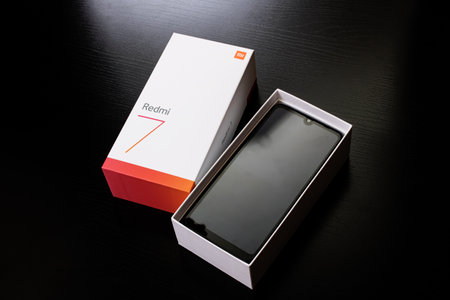 BELARUS, NOVOPOLOTSK - JULY 04, 2020: Phone in packing box Xiaomi Redmi 7 close up