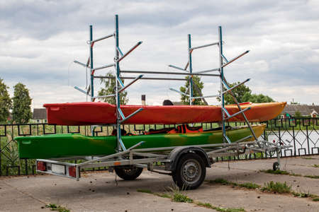 Boats on rack on the river bankの写真素材