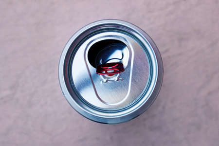 Tin can of beer close up, top view