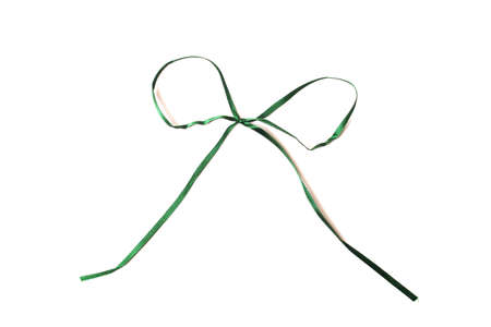 Green ribbon bow isolated on a white backgroundの写真素材
