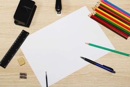 Stationery and blank paper on wooden table, copy space