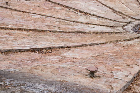 Disconnected old fountain system and autumn yellow leavesの写真素材