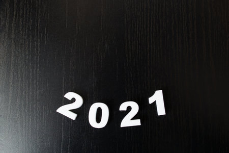White numbers 2021 on black background close up, new yearの写真素材