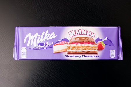 BELARUS, NOVOPOLOTSK - 20 DECEMBER, 2020: Milka chocolate close up on wooden table