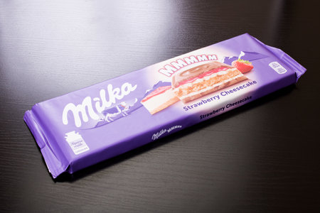 BELARUS, NOVOPOLOTSK - 20 DECEMBER, 2020: Milka chocolate close up on wooden tableのeditorial素材