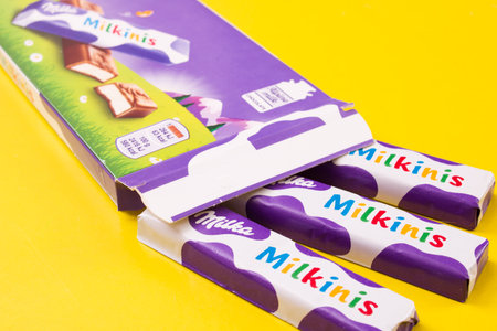 BELARUS, NOVOPOLOTSK - 20 DECEMBER, 2020: Milka chocolate close up on ellow backgroundのeditorial素材