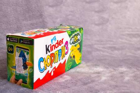 BELARUS, NOVOPOLOTSK - 03 JANUARY, 2021: Box with Kinder surprise and bird toys, copy spaceのeditorial素材
