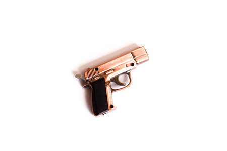 Metal fake pistol isolated on a white background