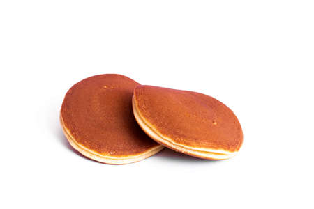 Two pancakes isolated on a white background close upの写真素材