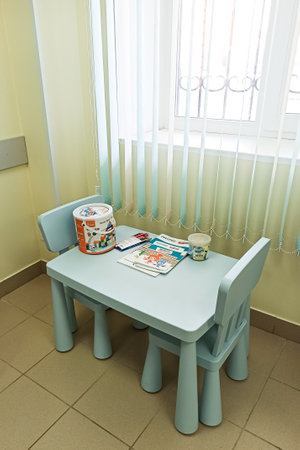 BELARUS, NOVOPOLOTSK - 22 FEBRUARY, 2021: Children's green table with coloring pagesのeditorial素材