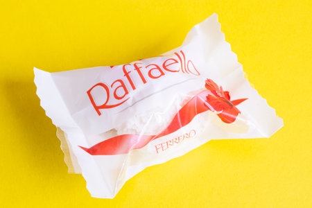 BELARUS, NOVOPOLOTSK - 11 MARCH, 2021: Raffaello candy on a yellow backgroundのeditorial素材