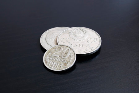 Two old USSR coins on a black background close upの写真素材