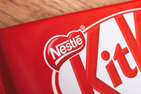 BELARUS, MINSK - 22 MARCH, 2021: Kit kat bar on wooden background close upのeditorial素材