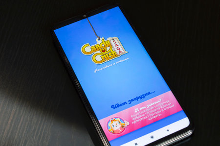 BELARUS, NOVOPOLOTSK - 27 MARCH, 2021: Candy crush game on phone display close upのeditorial素材