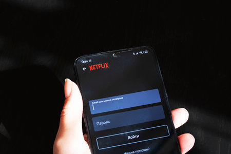 BELARUS, NOVOPOLOTSK - 27 MARCH, 2021: Netflix app on the phone display close up
