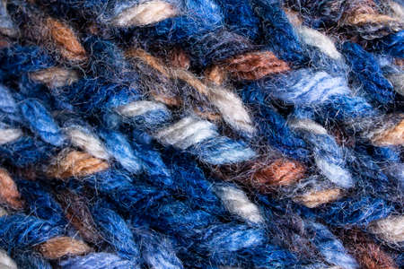 Large loops on blue wool knit fabric, background or textureの写真素材