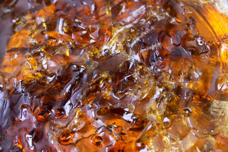 Brown rosin for soldering in a jar, backgroundの写真素材