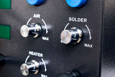 Adjustment knobs on the soldering station closeupの写真素材