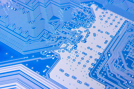 Tracks on the blue PCB close up, background or texture