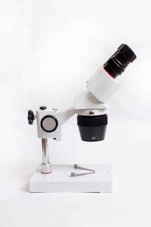 Gray medical microscope on a white background close upの写真素材