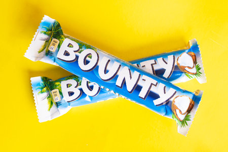 BELARUS, NOVOPOLOTSK - 12 APRIL, 2021: Bounty bar on yellow background close upのeditorial素材