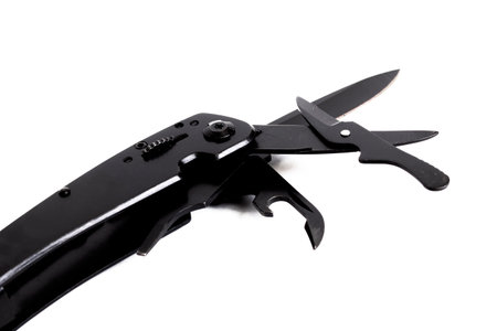 Black multi tool isolated on a white background