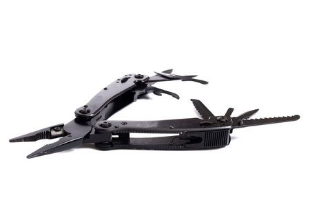 Black multi tool isolated on a white background