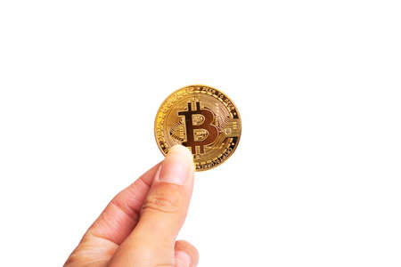 Bitcoin in hand isolated on white background close upの写真素材