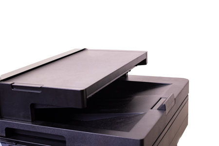 Black Scanner Paper Capacity isolated on white background close upの写真素材