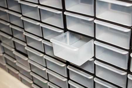 Plastic cells in the small change box close upの写真素材