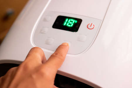 The set temperature on the air conditioner display close upの写真素材