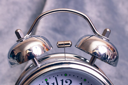 Gray metallic retro alarm clock bell close upの写真素材