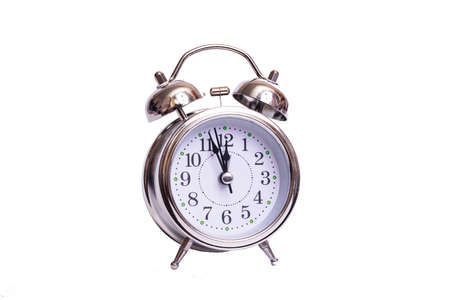 Metal retro alarm clock isolated on white background close upの写真素材