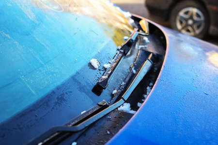Ice bloom on the blue surface of the carの写真素材