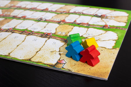 Belarus, Novopolotsk - 19 november, 2021: Chips on board of game carcassonneのeditorial素材