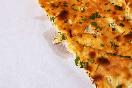 Ossetian pie with meat in a box close upの写真素材