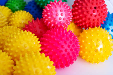 Multi-colored balls for physiotherapy close up, background or textureの写真素材