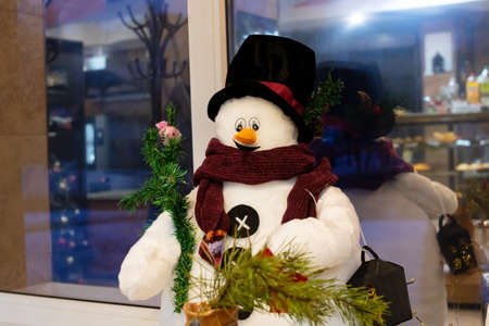 Decorative snowman on the windowsill, Christmas decoration