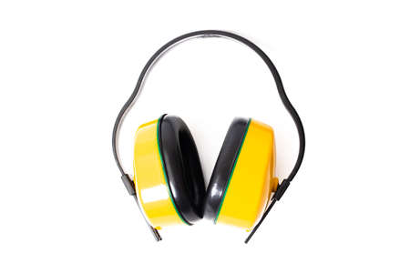 Yellow construction noise-cancelling headphones isolated on white background close upの写真素材