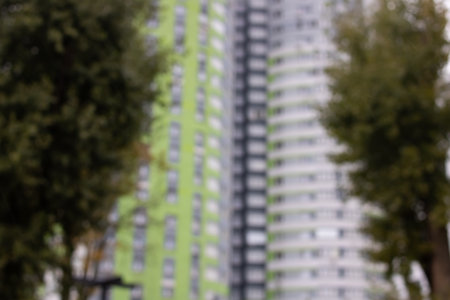 View of tall houses in the city blurred background