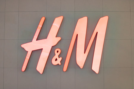 Belarus, Minsk - 26 september, 2022: Shop sign H and M close up