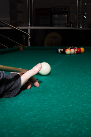 Billiard balls on a green table close up