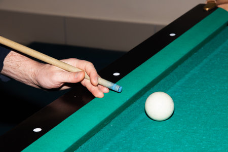 Billiard balls on a green table close up