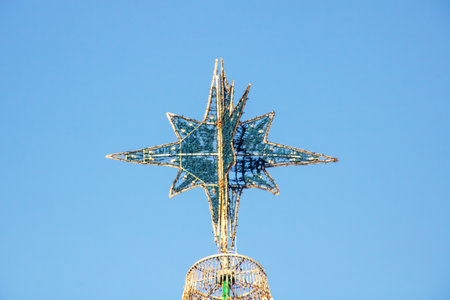 Christmas decorations on a green spruce, background or textureの写真素材
