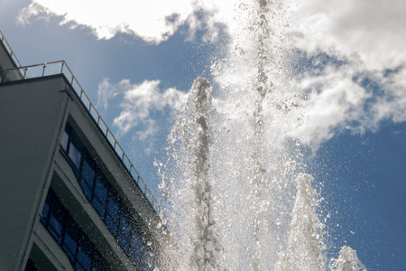 High jets of water fountain in the city close upの写真素材