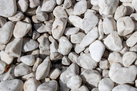 White round stones close up, background or texture