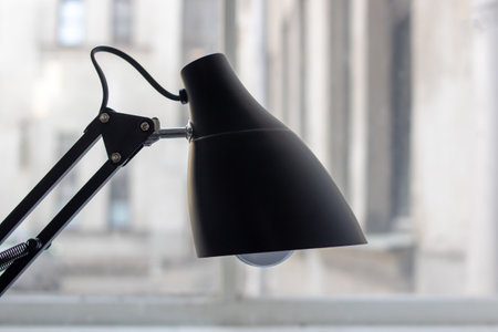 Black Table Lamp on Window Background close upの写真素材