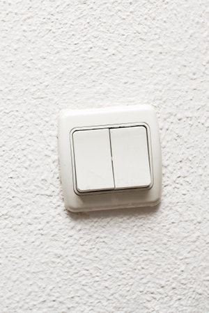 Two sockets on a white wallの写真素材