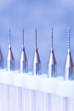 Dental drill attachment set on gray background close upの写真素材