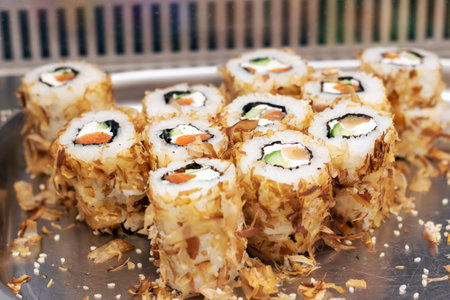 rolls with tuna on display close up, backgroundの写真素材